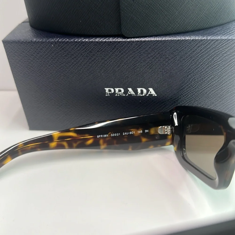 Prada PR06YS Brown Sunglasses with Bold Frames and UV Protection